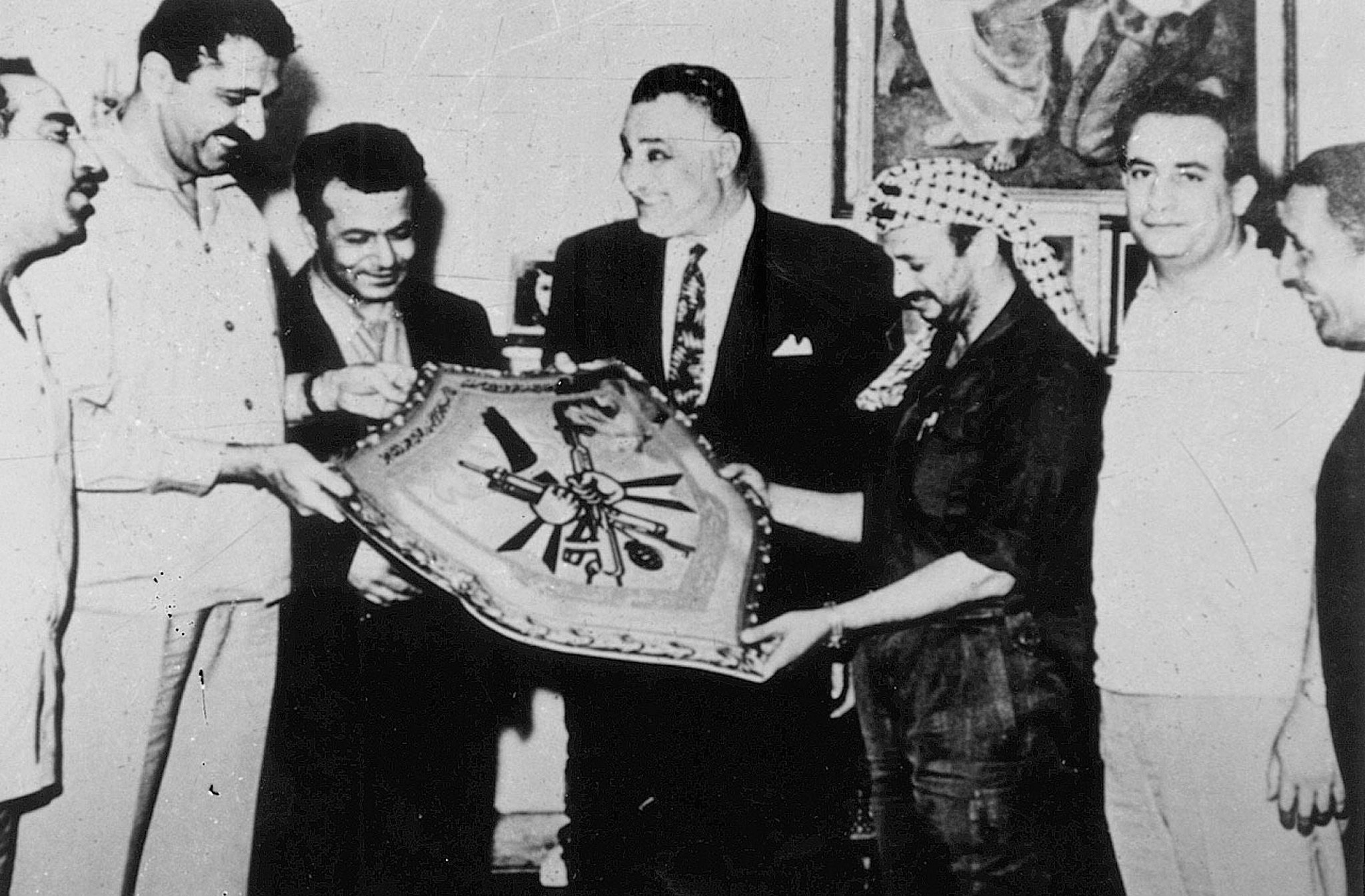 In this undated handout from the Palestinian Authority, PLO leader Yasser Arafat seen with Egyptian President Gamal Abdel Nasser in Egypt. (Palestinian Authorities via Abed Rahim Khatib/Flash90)