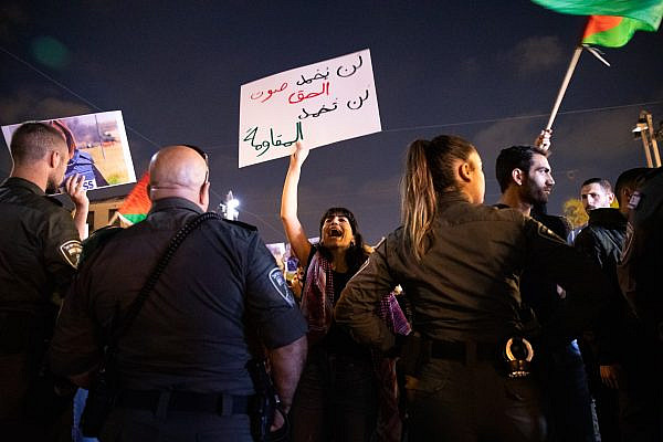 Palestinians attend a protest condemning the killing of Al Jazeera journalist Shireen Abu Aqleh by Israeli forces during a raid in the occupied West Bank city of Jenin, Haifa, May 11, 2022. (Shir Torem/Flash90)