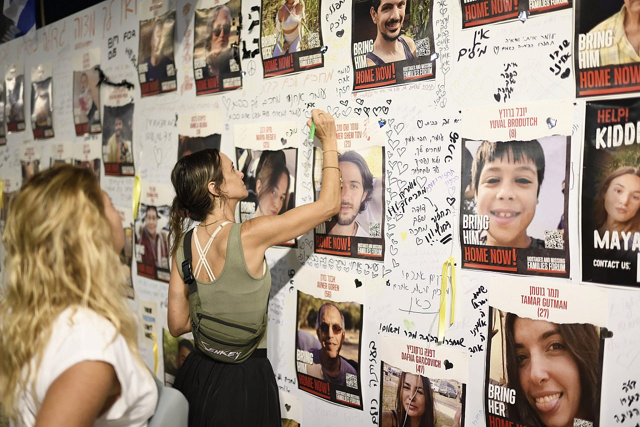 Familiies and friends of Israelis held hostage in Gaza hold an event at the "Hostages Square" outside the Tel Aviv Museum of Art, calling the Israeli government to act for the immediate release of the hostages on October 28, 2023. (Gili Yaari/FLASH90)