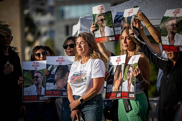 Families and friends of Israeli hostages being held in Gaza hold a rally at "Hostage Square," Tel Aviv, November 24, 2023. (Yonatan Sindel/Flash90)