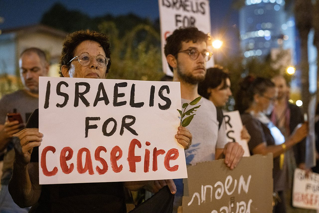 Activists protest against Israel's war on Gaza in Tel Aviv, November 11, 2023. (Oren Ziv)