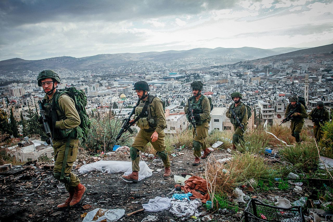 Israeli soldiers are seen during a raid in the Balata refugee camp, east of Nablus, occupied West Bank, November 19, 2023. (Nasser Ishtayeh/Flash90)