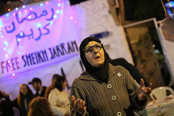Fatma Salem speaks during a solidarity gathering in Sheikh Jarrah, occupied East Jerusalem. (Yahel Gazit)