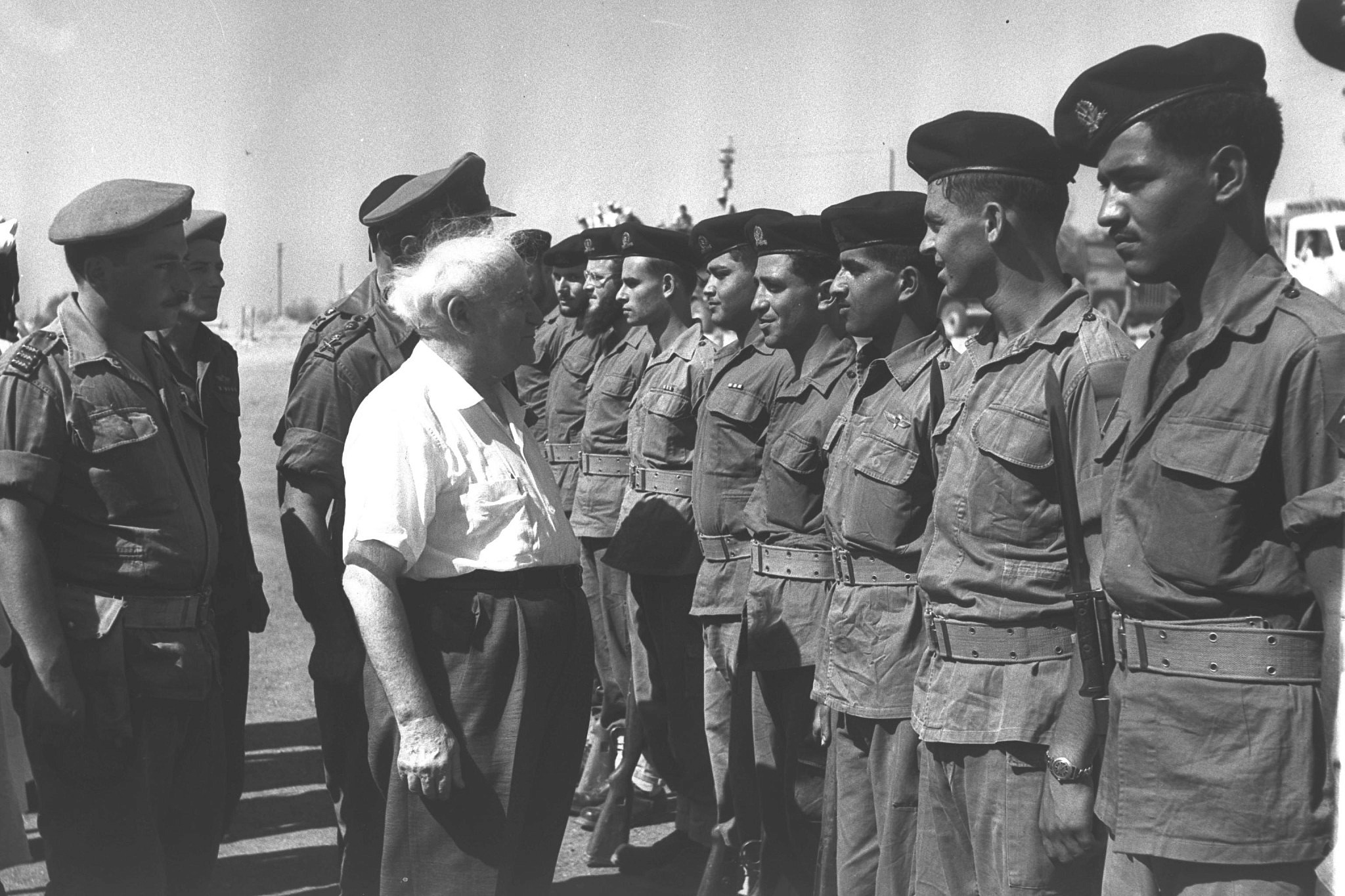 Israeli Prime Minister David Ben Gurion inspects a guard of honor at Be'er Ora Gadna Base, near Eilat, June 13, 1957. (Moshe Pridan/GPO)