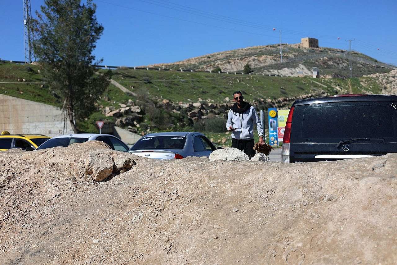 A dirt mound blocks traffic in the area of Mazmoria, east of Bethlehem, occupied West Bank. (Yuval Abraham)