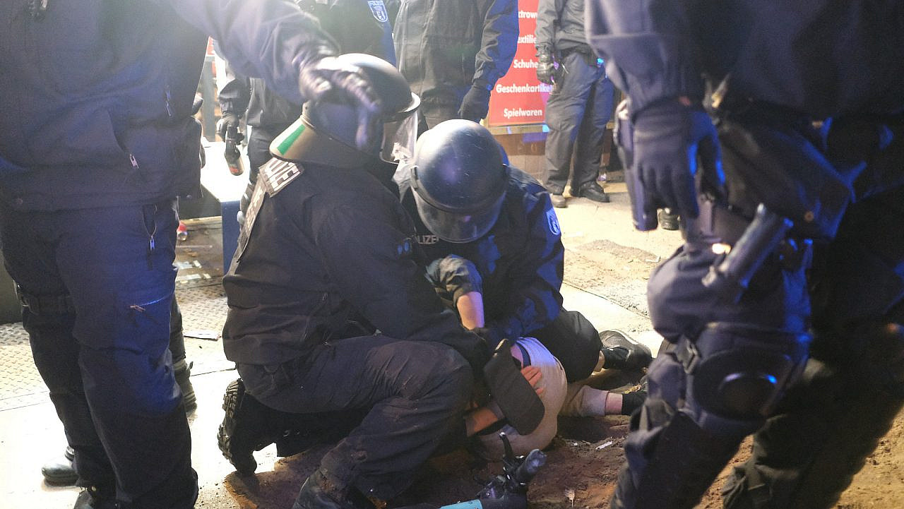 Police suppress a pro-Palestine demonstration in the Neukolln area of Berlin, October 18, 2023. 