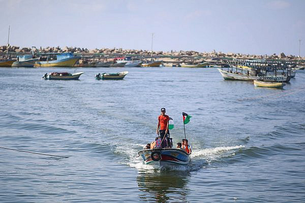 Palestinians seen at the port of Gaza City, June 13, 2019. (Hassan Jedi/Flash90)