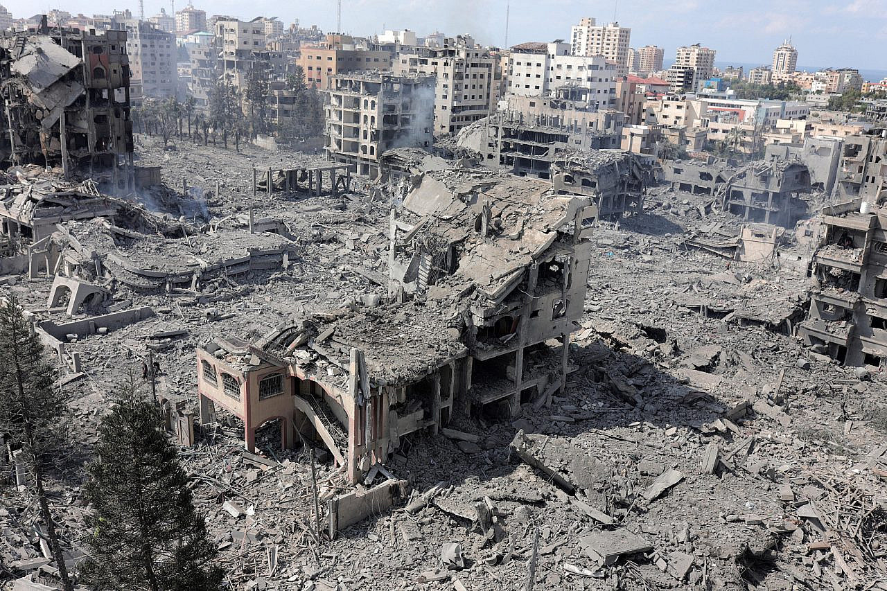 Massive destruction is seen in Al-Rimal popular district of Gaza City after it was targeted by airstrikes carried out by Israeli colonial, October 10, 2023. (Mohammed Zaanoun)