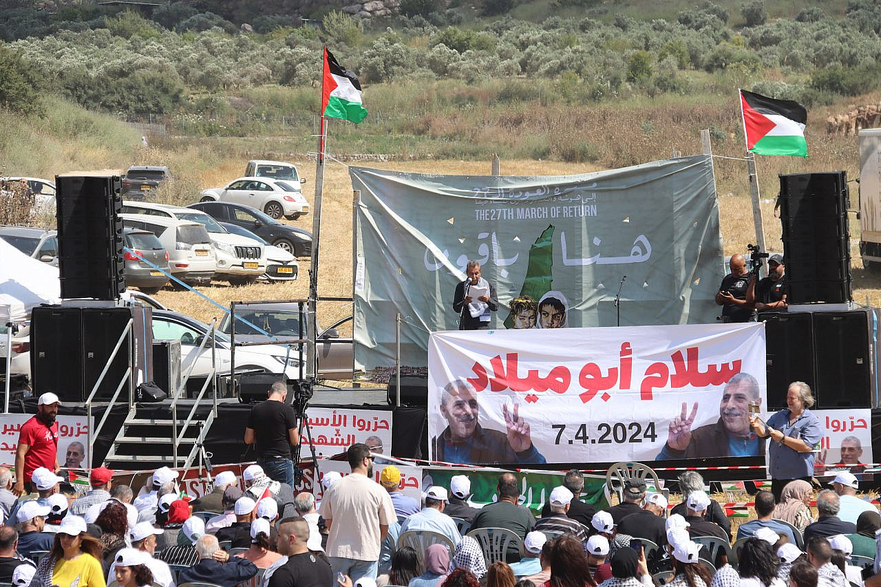 Protesters gather at the stage during the 27th annual March of Return in the depopulated villages of Hawsha and Al-Kasair, northern Israel, May 14, 2024. (Ahmad Al-Bazz)