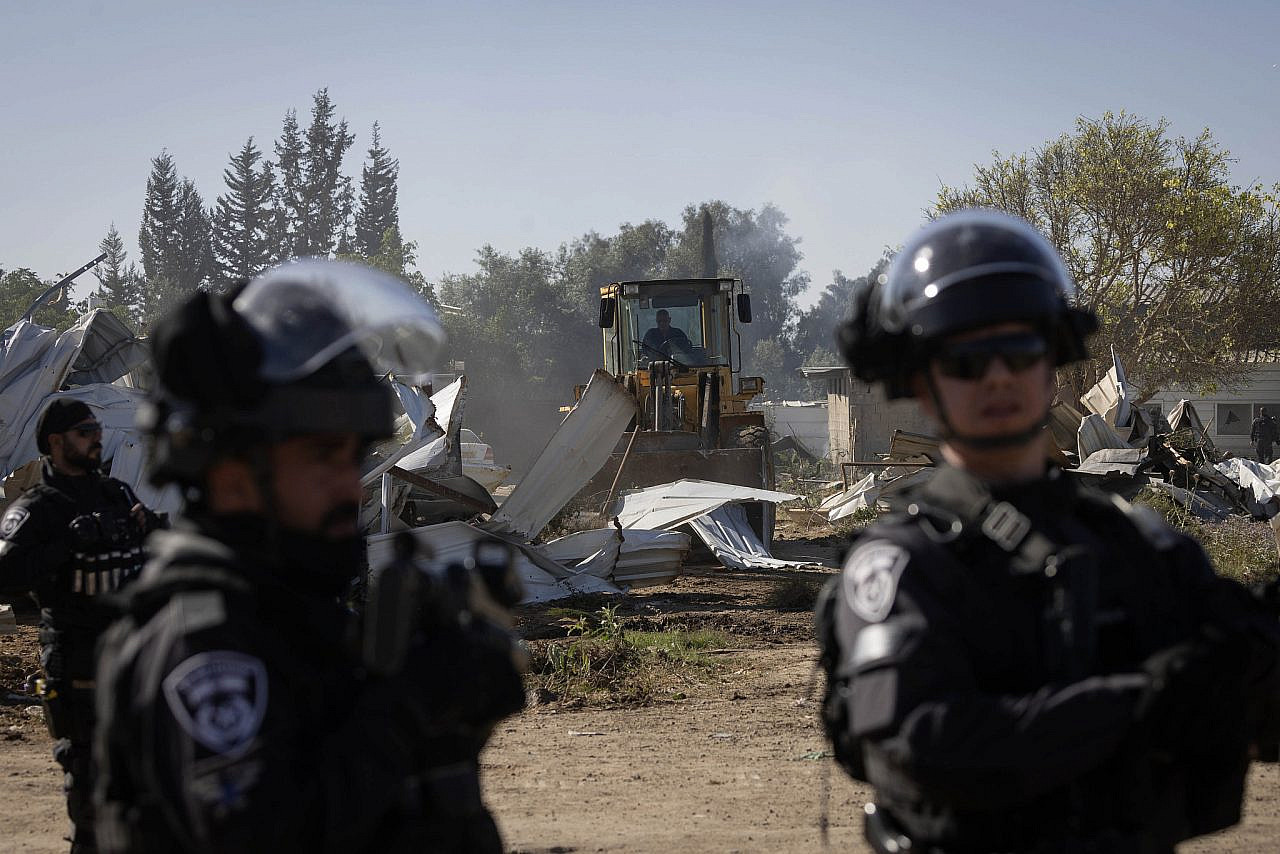 Israeli forces raze houses in the unrecognized village of Wadi al-Khalil in the Naqab, May 8, 2024. (Oren Ziv)