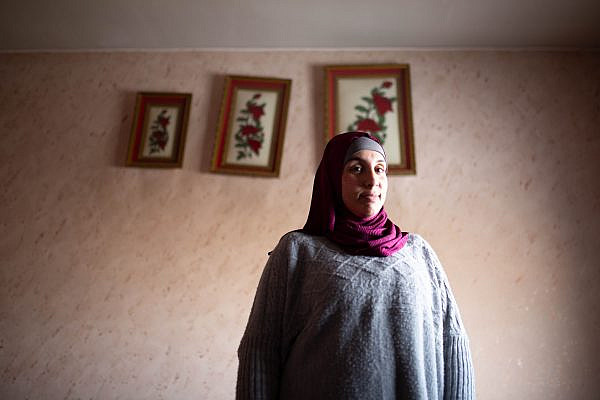 Shoug Al Adara in her home in At-Tuwani, December 2023. (Emily Glick)