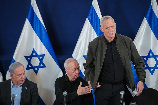 Minister Benny Gantz speaks during a press conference at the Ministry of Defense in Tel Aviv, December 16, 2023. (Noam Revkin Fenton/Flash90)