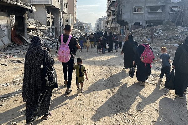 Palestinians flee the neighborhood of Al-Rimal in response to Israeli evacuation orders, Gaza City, July 8, 2024. (Ferial Abdu)