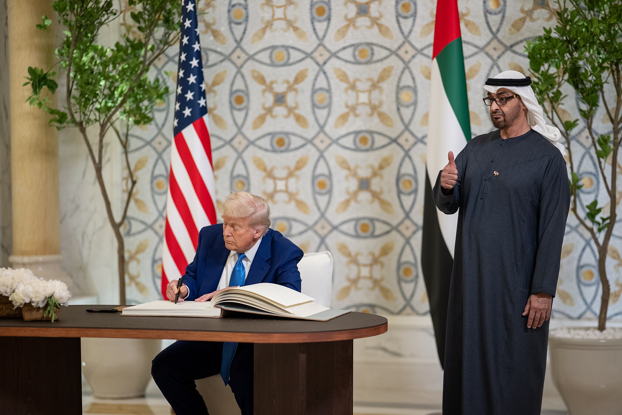 President Donald Trump signs the guest book at Qasr Al Watan in Abu Dhabi, United Arab Emirates, May 15, 2025. (Official White House Photo/Daniel Torok)