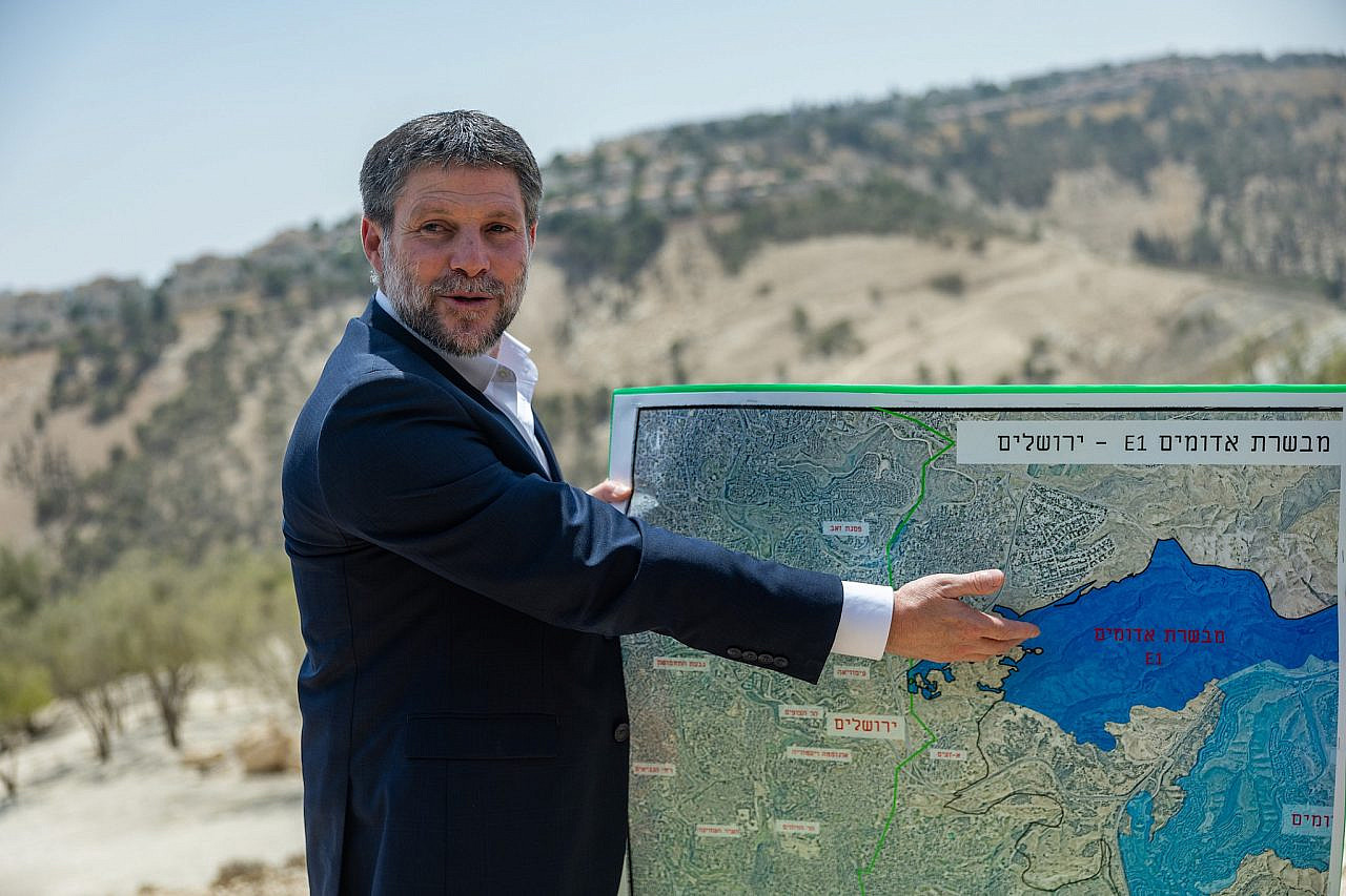 Israeli Finance Minister Bezalel Smotrich attends a press conference announcing his plans to approve more than 3,000 housing units in the E1 settlement project between Jerusalem and Ma’ale Adumim, August 14, 2025. (Yonatan Sindel/Flash90)