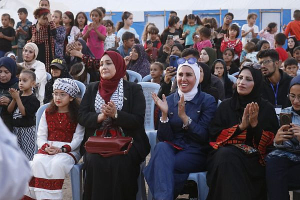 Attendees gather for the opening of the Gaza International Festival for Women's Cinema, Deir Al-Balah, central Gaza Strip, October 26, 2025. (Courtesy of the Gaza International Festival for Women's Cinema)