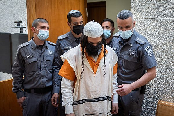 Amiram Ben-Uliel, convited of over the Duma arson attack in July 2015, arrives to a court hearing on his appeal, at the Supreme Court in Jerusalem, March 7, 2022. (Yonatan Sindel/Flash90)