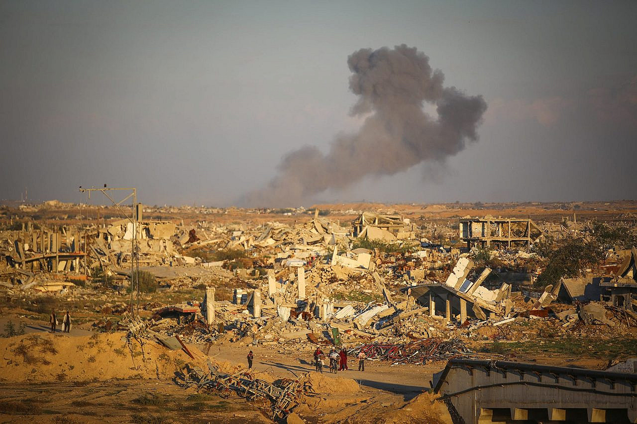 Smoke rises following an Israeli airstrike in Gaza City, December 2, 2025. (Ali Hassan/Flash90)