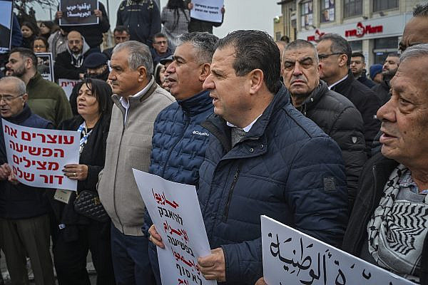 Palestinian citizens of Israel, including Hadash party head Ayman Odeh, hold a mass demonstration against the epidemic of criminal violence and state neglect, Sakhnin, northern Israel, January 22, 2026. (Michael Giladi/Flash90)