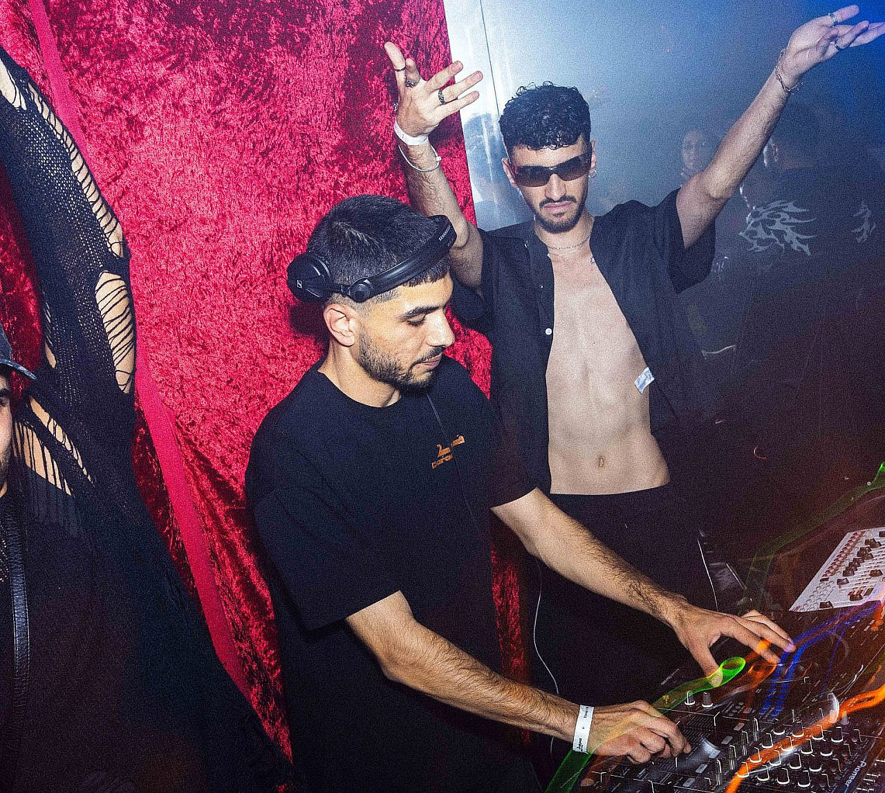 A DJ performs at Daraq Crew's one-year anniversary party. (Courtesy)