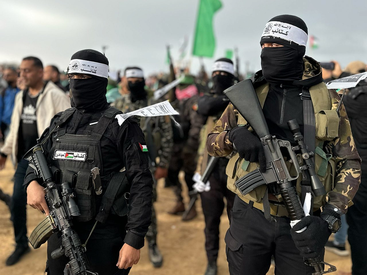 Hamas militants show force during the handing over of hostage bodies to the Red Cross in Khan Younis, southern Gaza, February 20, 2025. (Doaa Albaz/Activestills)