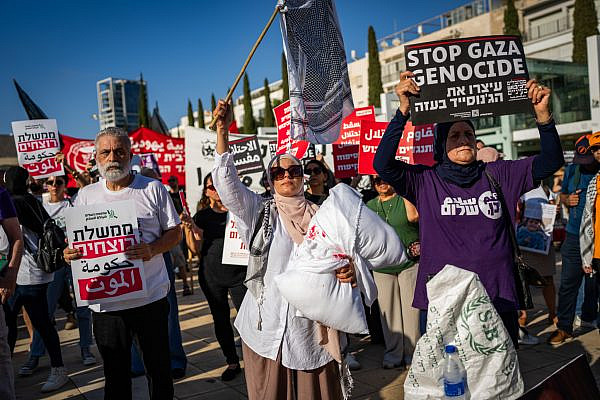 Activists protest in Tel Aviv demanding an end to the war in Gaza, August 23, 2025. (Erik Marmor/Flash90)