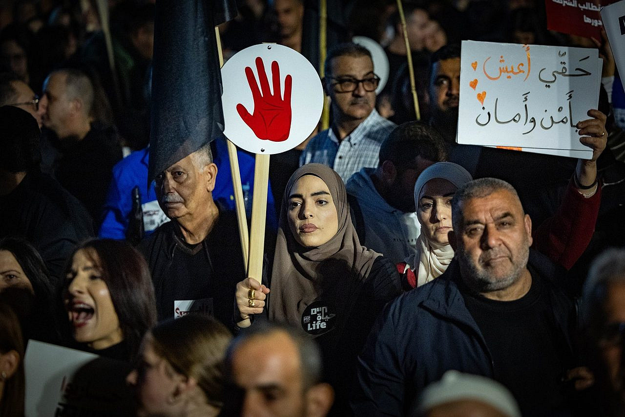 Palestinian and Jewish citizens of Israel attend a protest against rising violent crime in Palestinian society, in Tel Aviv, January 31, 2026. (Yonatan Sindel/Flash90)