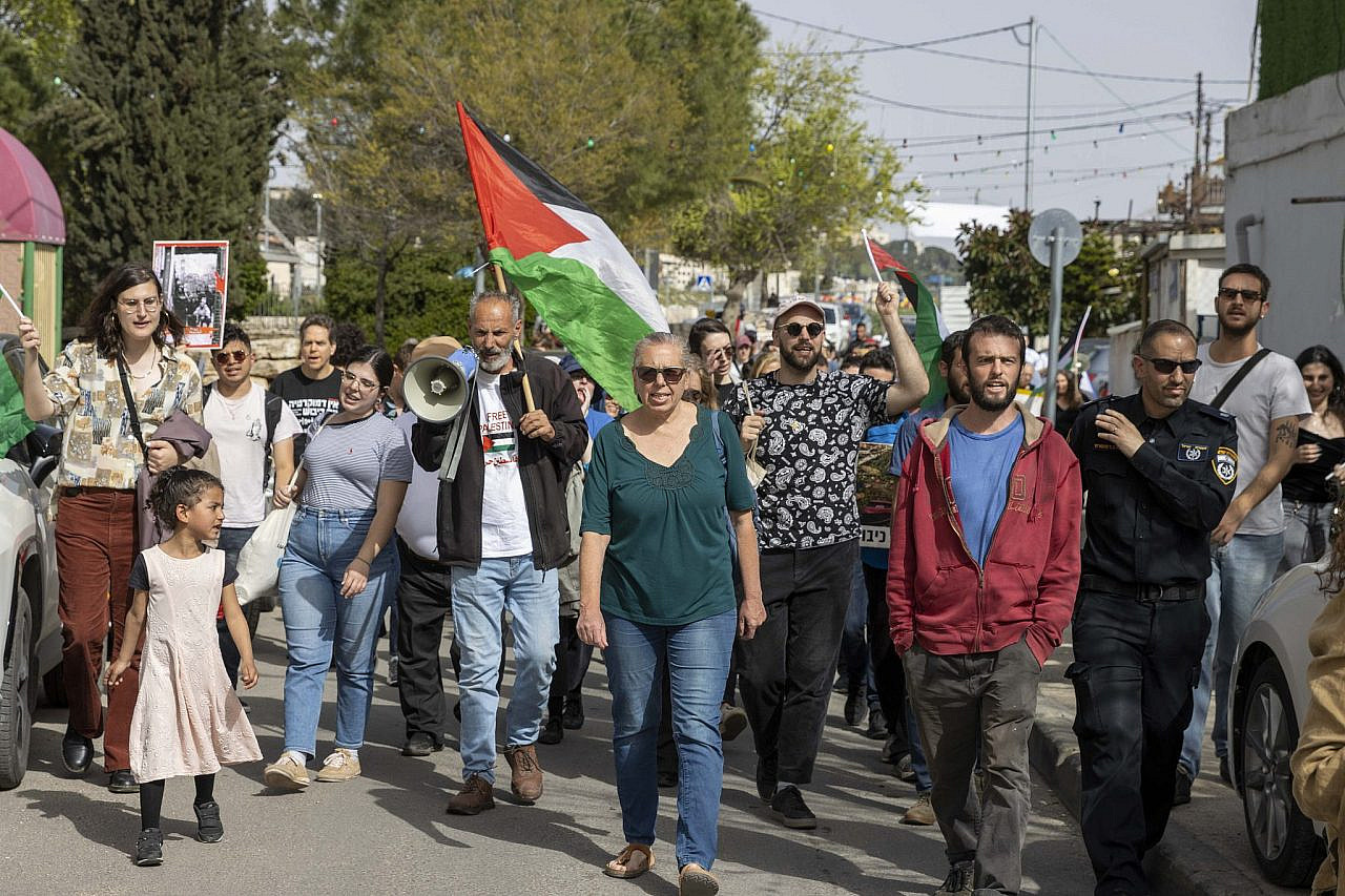 Palestinian residents, joined by Israelis and internationals, hold a weekly protest in Sheikh Jarrah, Jerusalem, March 24, 2023. (Heather Sharona Weiss/Activestills)