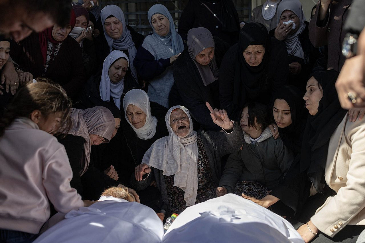 Palestinians in the village of Qaryut mourn the killing of two residents who were shot dead by an Israeli settler, occupied West Bank, March 3, 2026. (Oren Ziv)