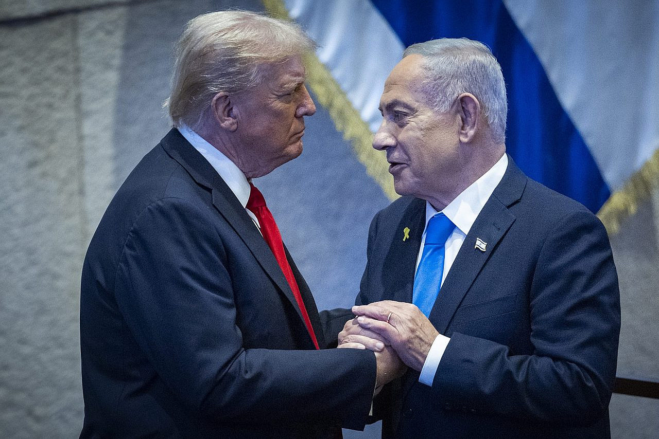 U.S. President Donald Trump with Israeli Prime Minister Benjamin Netanyahu during a special plenum session in honor of President Trump at the Knesset, Israel's parliament in Jerusalem, on October 13, 2025. (Yonatan Sindel/Flash90)