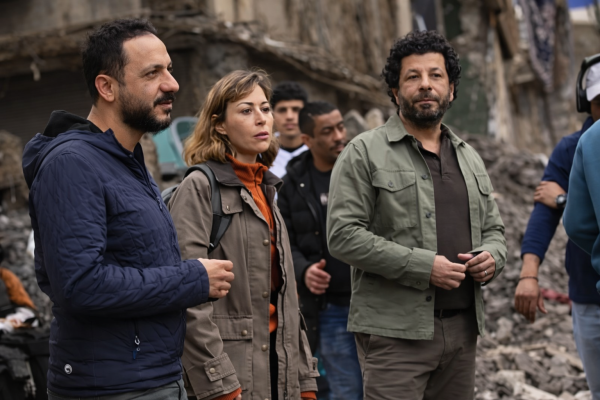 Iyad Nassar, Menna Shalabi, and director Peter Mimi on the set of Sohab Al-Ard in Egypt, February 2026. (Courtesy of United Media Services)