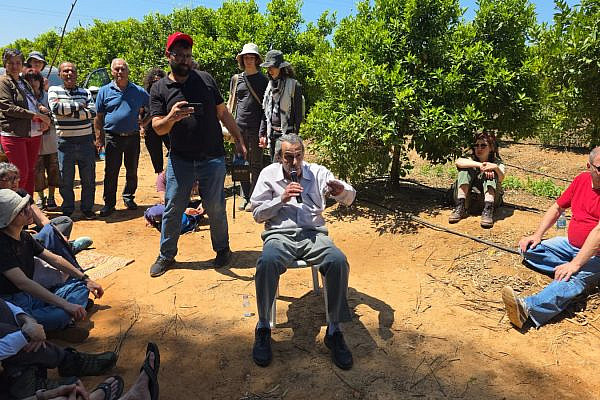 Abd Al Mannan Shbita speaks to Palestinian and Jewish Israeli activists, at the site of the former village of Miska, depopulated in the 1948 war, central Israel, April 22, 2026. (Iddo Elam, Zochrot)