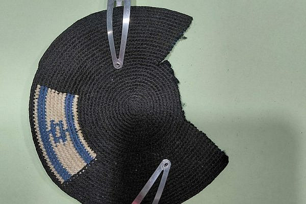 Alex Sinclair's kippah, returned to him by police after they cut out the Palestinian flag sewn into it. (Alex Sinclair)