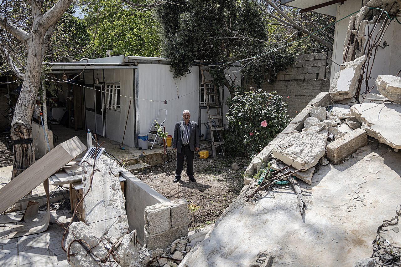 Fakhri Abu Diab, beside the rubble of his house that the Jerusalem Municipality demolished in 2024, Al-Bustan, Silwan, occupied East Jerusalem. (Faiz Abu Rmeleh)