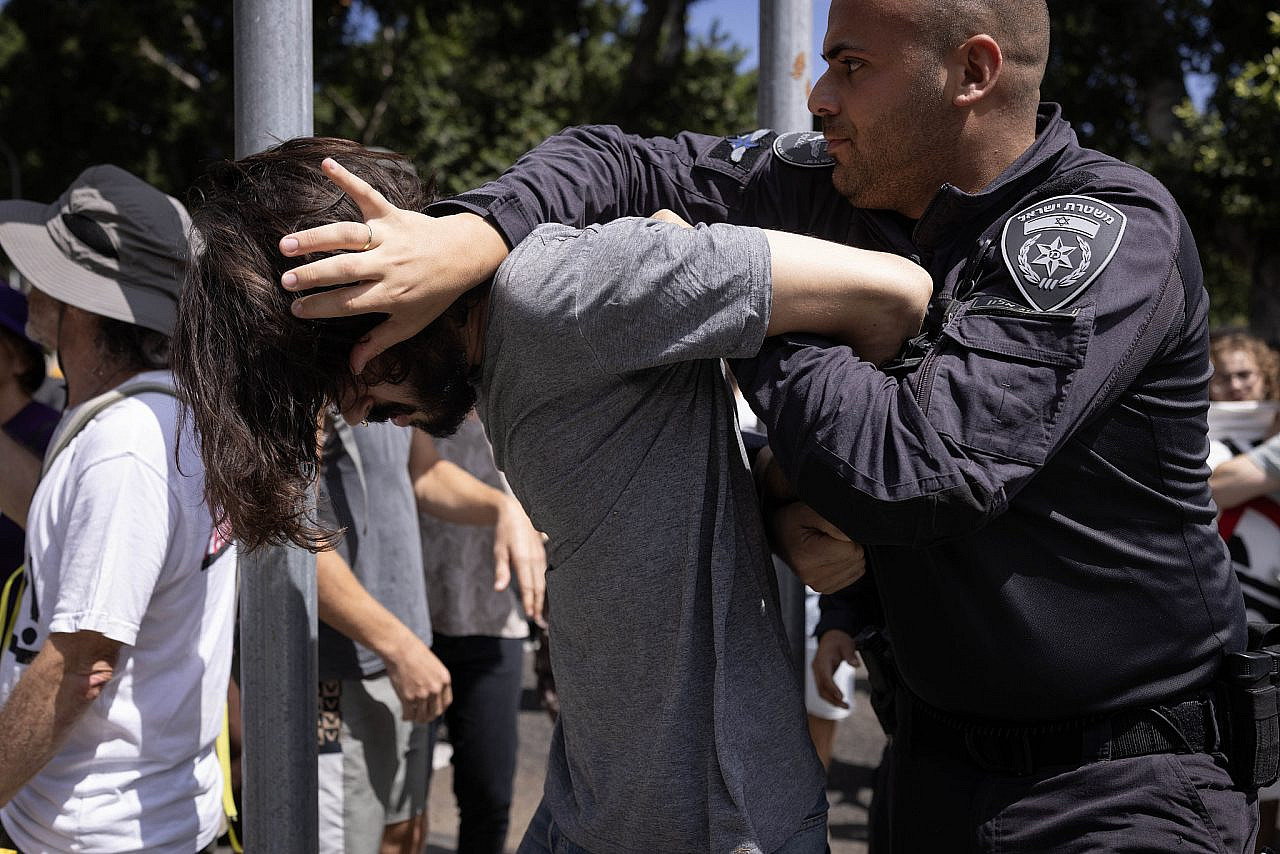 Israeli police arrest ten activists during a protest in solidarity with Yona Roseman, who is refusing to enlist in the military, Haifa, Israel, August 17, 2025. (Oren Ziv/Activestills)