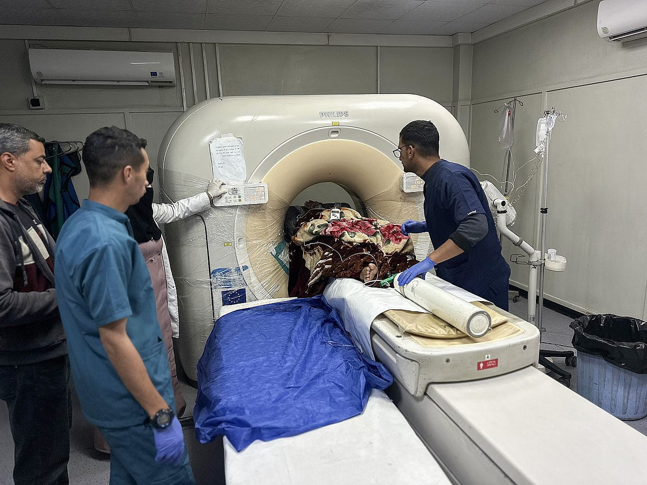 Doctors at Nasser Medical Complex, Khan Yunis, Gaza Strip, warn that medical diagnostic services could be halted in southern Gaza, April 18, 2026. There is only one CT scanner, operating under immense strain, receiving approximately 100 cases daily. (Doaa Albaz)