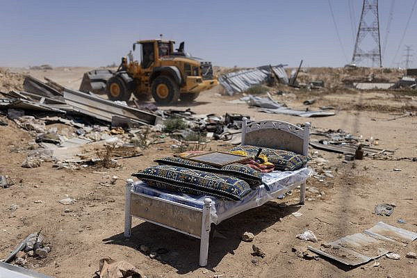 Residents salvage furniture before demolishing their homes, A-Sir, Israel, June 16, 2026. (Oren Ziv)