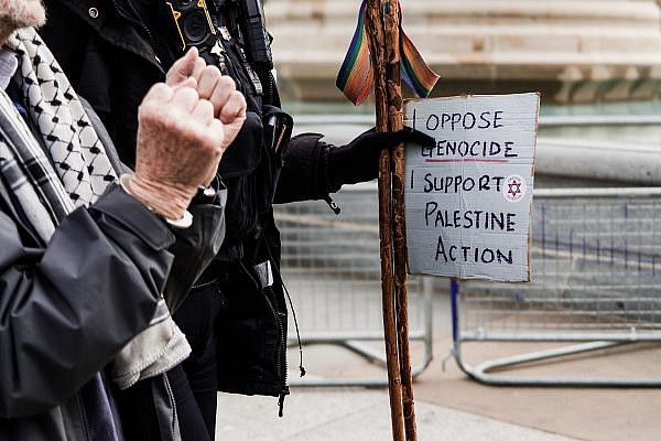 Police arrest a protester during a demonstration in support of Palestine Action in Trafalgar Square, London, April 11, 2026. (Talia Woodin)