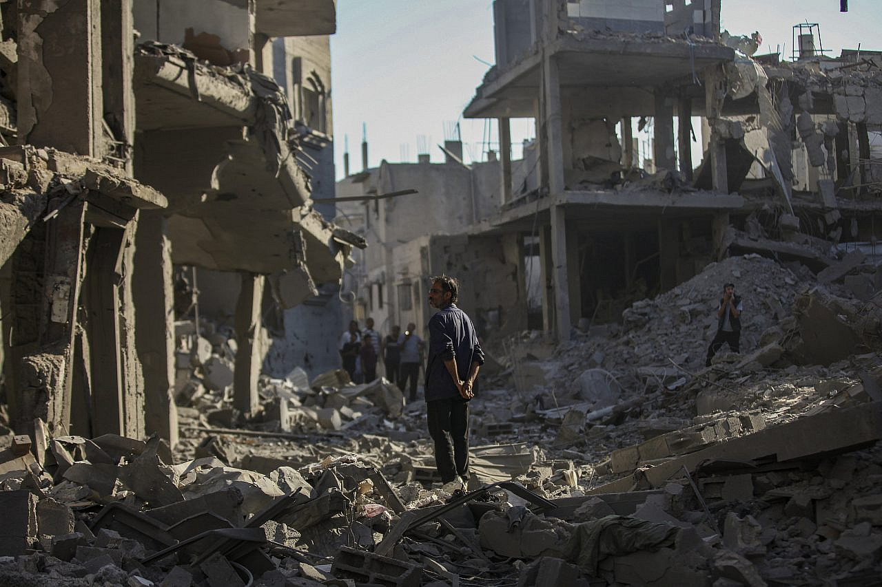 Palestinians inspect the damage to their homes following an Israeli airstrike on Al-Maghazi refugee camp in the central Gaza Strip, June 12, 2026. (Ali Hassan/Flash90)