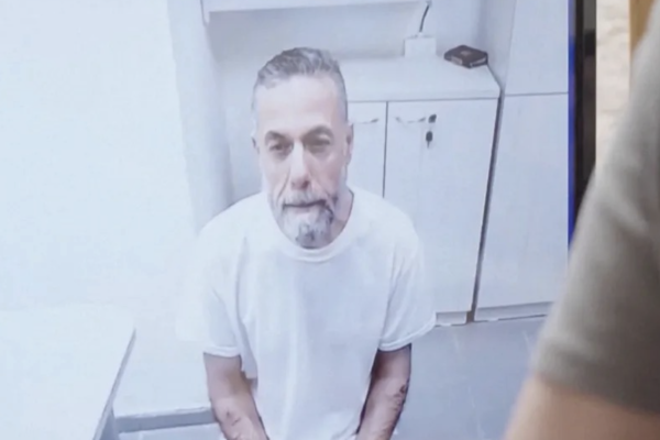 Palestinian doctor Hussam Abu Safiya, captured and detained by the Israeli army in Gaza in December 2024 and still in detention appears via video conference for his Israeli Supreme Court hearing in Jerusalem, June 10, 2026. (Abeer Salman)