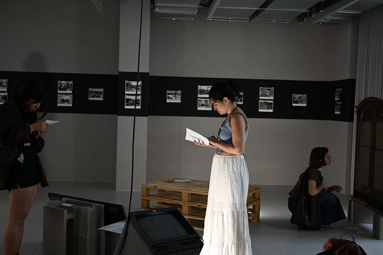 Students attend the exhibition "The Splinter" at the University of Applied Arts Vienna, Austria. (Pasha Kogan)