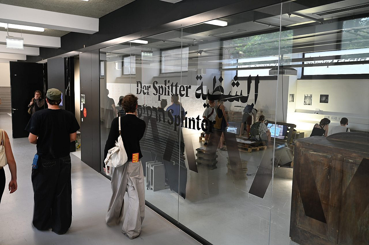 Students attend the exhibition "The Splinter" at the University of Applied Arts Vienna, Austria. (Pasha Kogan)