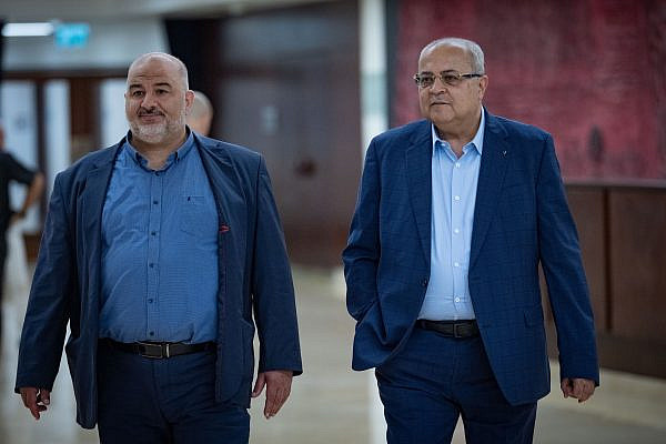 Members of Knesset Mansour Abbas and Ahmad Tibi walking outside the office of Israeli Prime Minister Benjamin Netanyahu at the Knesset, in Jerusalem, June 3, 2026. (Yonatan Sindel/Flash90)