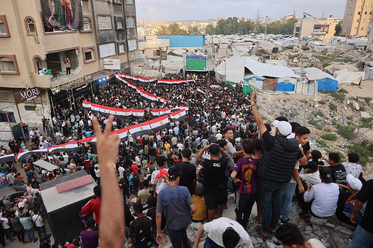 Palestinian fans watch the Egypt-Argentina World Cup game in the Rimal neighborhood of Gaza City, July 7, 2026. (Omar Al-Qattaa)