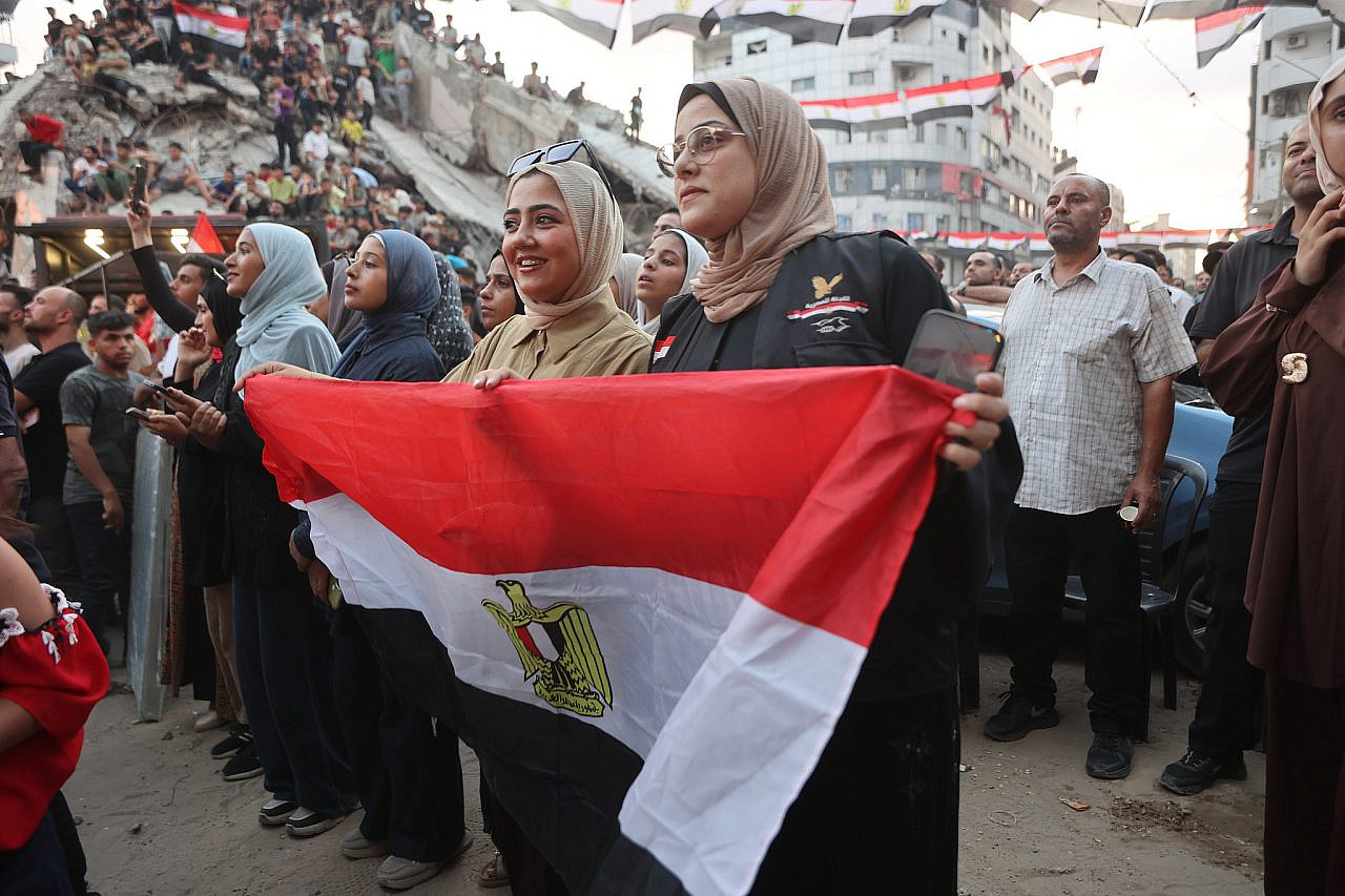 Palestinian fans watch the Egypt-Argentina World Cup game in the Rimal neighborhood of Gaza City, July 7, 2026. (Omar Al-Qattaa) ‘They celebrate goals, we count martyrs’: Watching the World Cup in Gaza