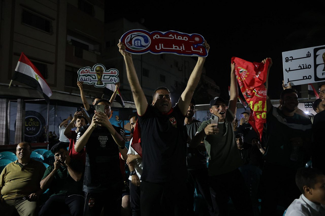 Palestinians watch the Egypt vs. Belgium match, part of the 2026 World Cup, in a cafe in Gaza City, June 15, 2026. (Omar Al-Qataa)