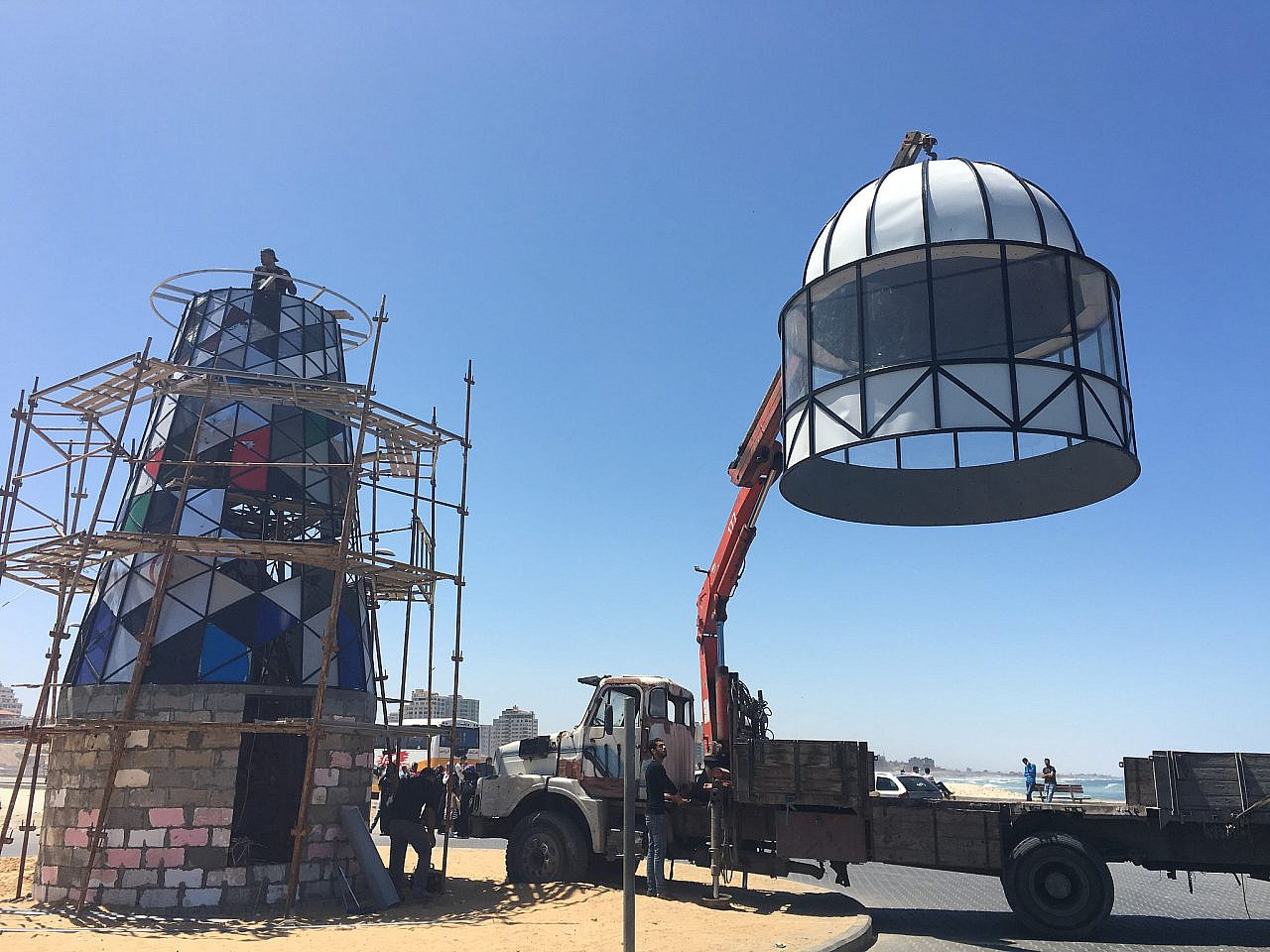 The creation of Shareef Sarhan's Minarat Gaza, seen in Gaza City's port, 2016. (Courtesy)