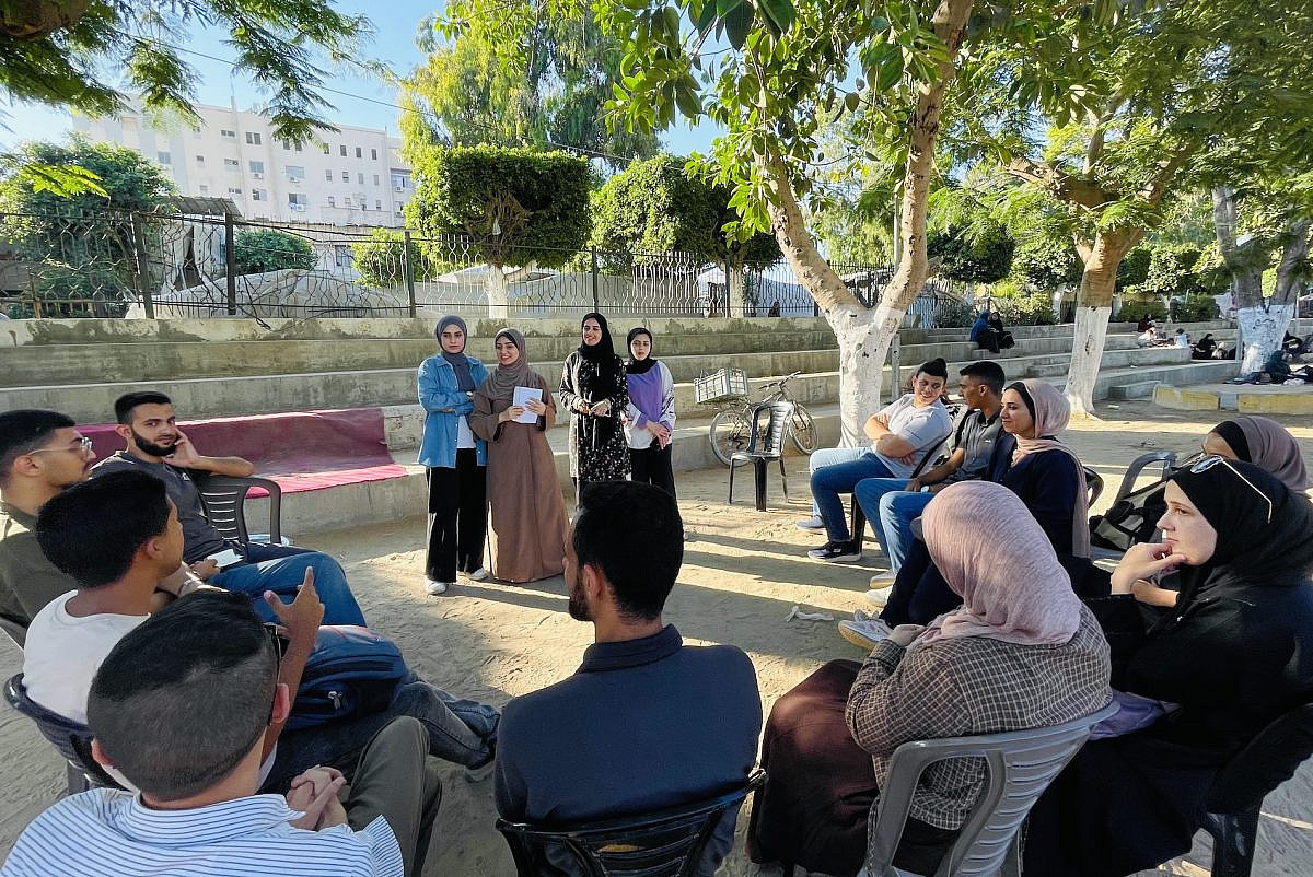 Members of "Gaza English Corner" meet in a park in Gaza City, August 2026. (Said Alsaloul)