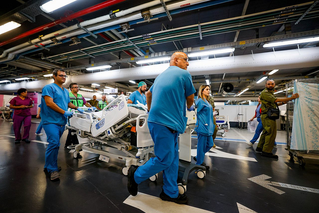Israeli soldiers and medical staff at the underground hospital at the Rambam Hospital in Haifa, September 2, 2024. (Chaim Goldberg/Flash90)