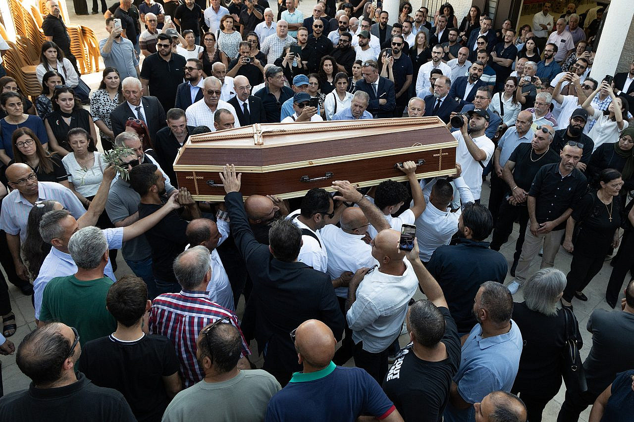 Mourners carry the casket of Sliman Mansour at his funeral in Birzeit, occupied West Bank, August 26, 2026. (Wahaj Bani Moufleh)